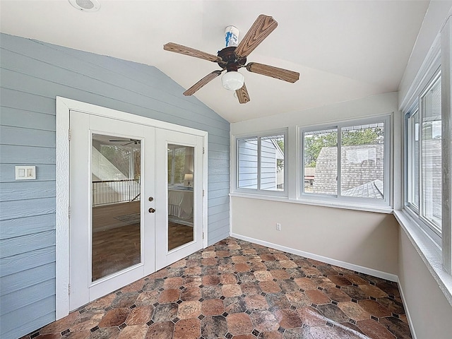 unfurnished sunroom with french doors