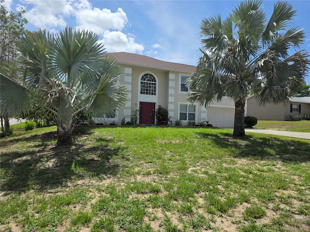 6440 Curtiss Ln, Spring Hill, FL 34608 - view of front of house with a garage, stucco siding, a front yard, and driveway