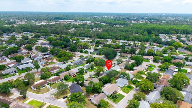 aerial view of property's location featuring nearby suburban area