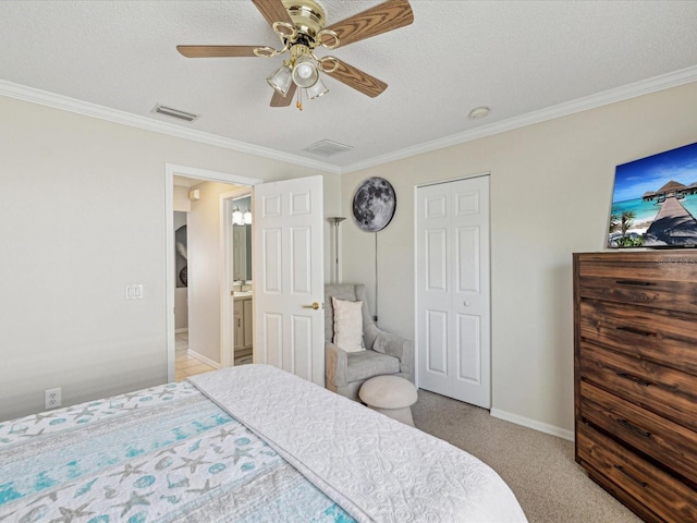 11342 Hollander Ave, Hudson, FL 34667 - bedroom with ornamental molding, baseboards, a textured ceiling, carpet, and a ceiling fan
