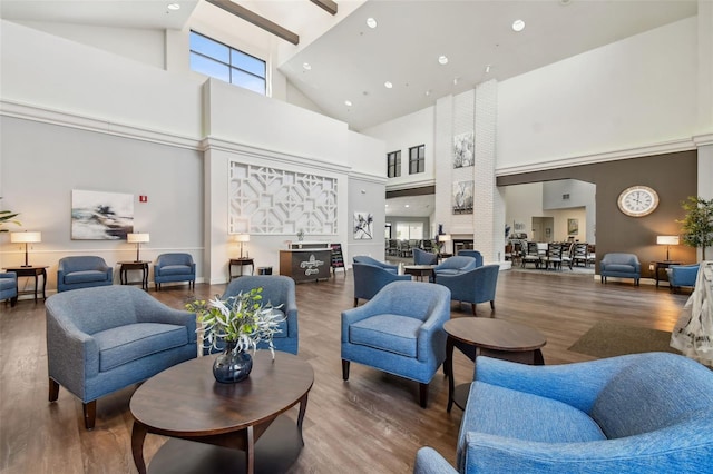 lobby with high vaulted ceiling and recessed lighting
