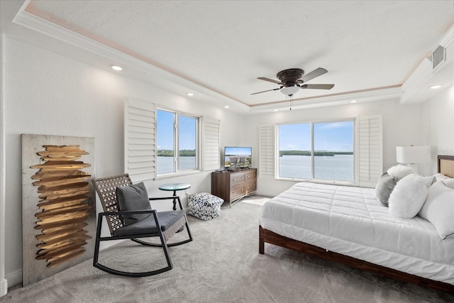 4550 Bay Blvd Unit 1231, Port Richey, FL 34668 - bedroom featuring light colored carpet, a tray ceiling, recessed lighting, ornamental molding, and ceiling fan
