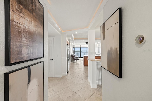 4550 Bay Blvd Unit 1231, Port Richey, FL 34668 - corridor with light tile patterned floors and crown molding