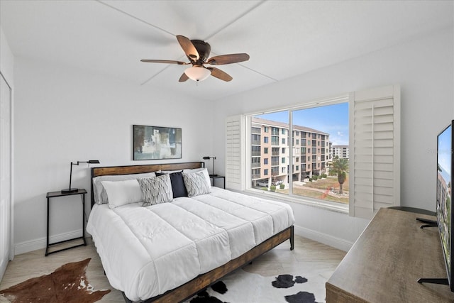 4550 Bay Blvd Unit 1231, Port Richey, FL 34668 - bedroom featuring baseboards and ceiling fan