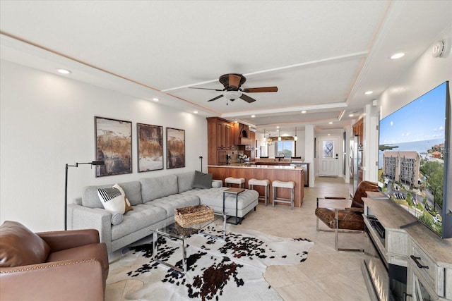 4550 Bay Blvd Unit 1231, Port Richey, FL 34668 - living area featuring a ceiling fan, recessed lighting, light tile patterned flooring, and a tray ceiling
