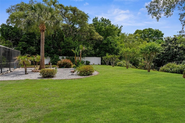 view of yard with fence