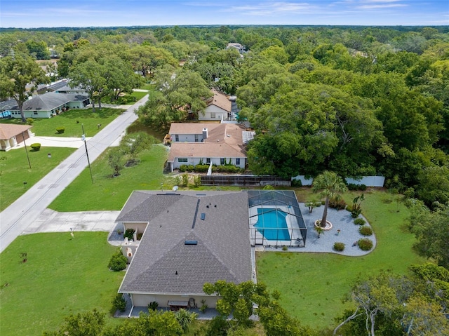 bird's eye view featuring a forest view