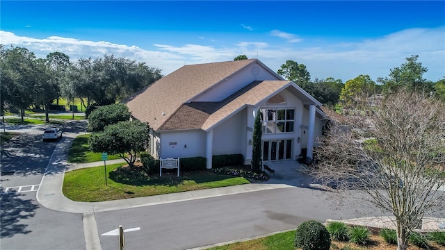 view of front of property with a shingled roof