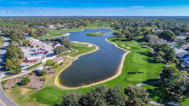 birds eye view of property with a water view, golf course view, and a residential view