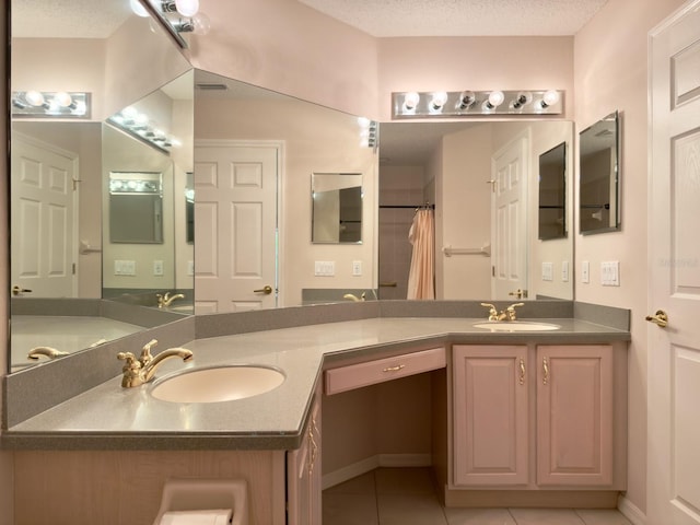 full bath featuring tile patterned flooring and double vanity