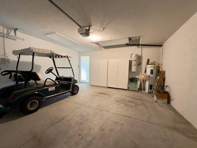 garage with electric water heater and a garage door opener