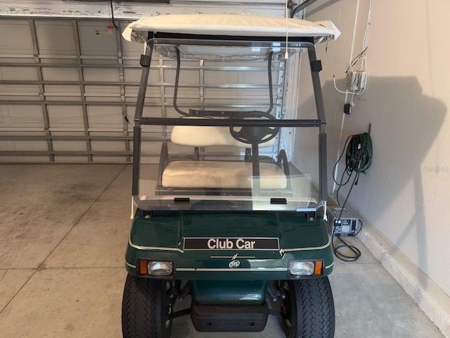 garage featuring baseboards