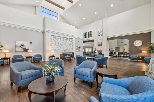 lobby with high vaulted ceiling and recessed lighting