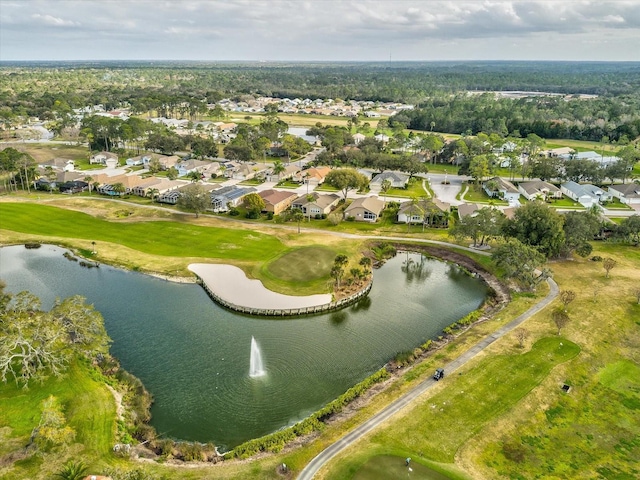 view of property location with nearby suburban area, a large body of water, and a golf club