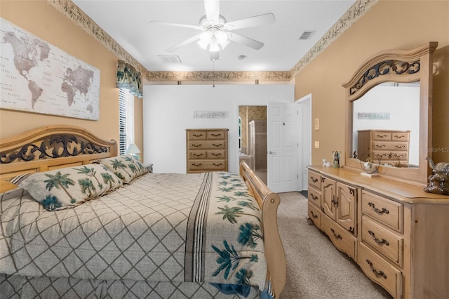 11443 Marsh Creek Ct, New Port Richey, FL 34654 - bedroom with light carpet and a ceiling fan