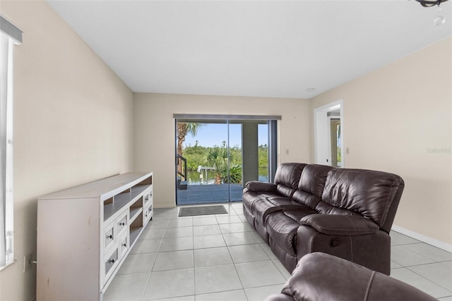 6321 Garland Ct, New Port Richey, FL 34652 - living room with baseboards and light tile patterned floors