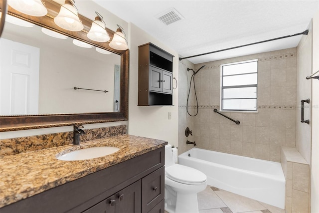 6321 Garland Ct, New Port Richey, FL 34652 - bathroom with tile patterned flooring, bathtub / shower combination, vanity, and toilet