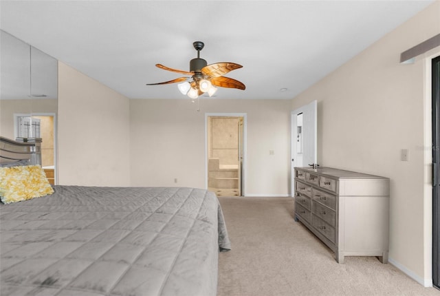 6321 Garland Ct, New Port Richey, FL 34652 - bedroom with light carpet, baseboards, ceiling fan, and ensuite bath