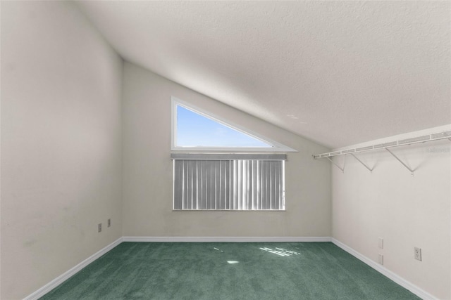 6321 Garland Ct, New Port Richey, FL 34652 - bonus room featuring carpet flooring, baseboards, and a textured ceiling