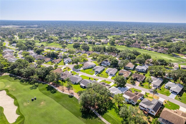 aerial perspective of suburban area with a local golf course