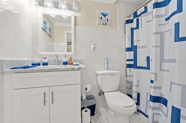 bathroom with tile walls, marble look tile flooring, toilet, vanity, and curtained shower