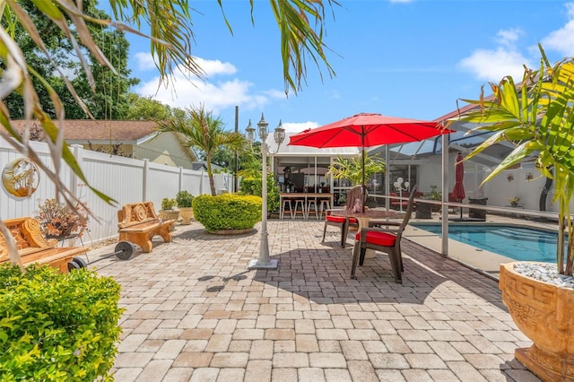 view of patio featuring fence