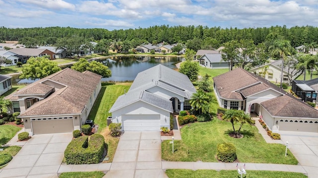 1053 Winding Willow Dr, Trinity, FL 34655 - aerial perspective of suburban area with a large body of water
