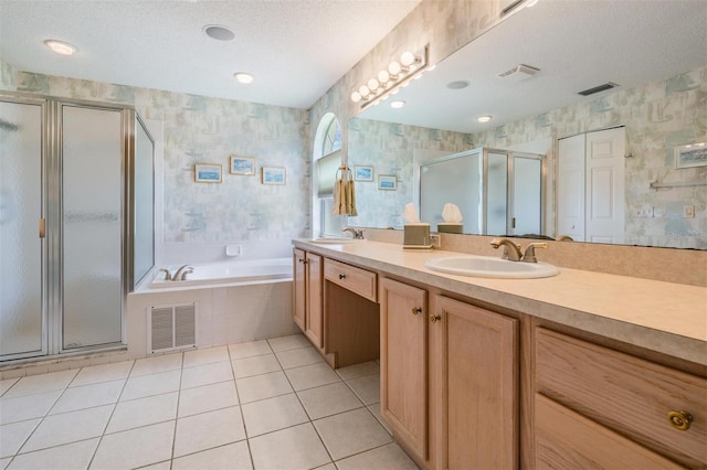 1053 Winding Willow Dr, Trinity, FL 34655 - full bath featuring wallpapered walls, a garden tub, a shower stall, double vanity, and tile patterned flooring