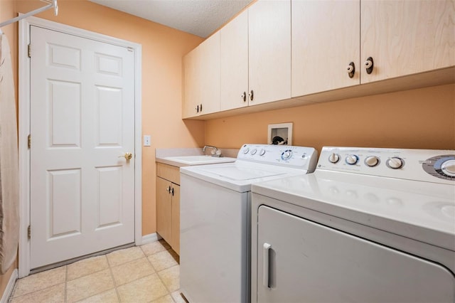 1053 Winding Willow Dr, Trinity, FL 34655 - clothes washing area featuring washing machine and dryer, cabinet space, and baseboards