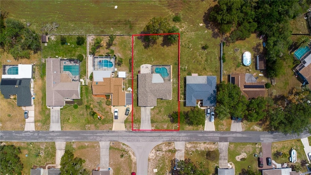 8126 Wooden Dr, Spring Hill, FL 34606 - aerial overview of property's location with property boundaries highlighted and a pool area