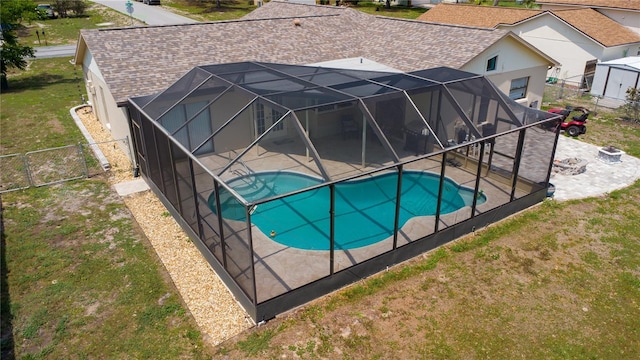 8126 Wooden Dr, Spring Hill, FL 34606 - outdoor pool with a patio and glass enclosure