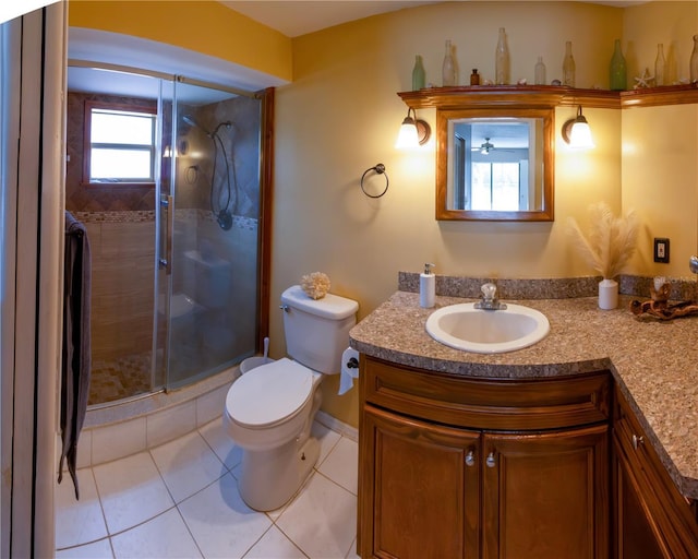 8126 Wooden Dr, Spring Hill, FL 34606 - bathroom with toilet, a stall shower, tile patterned flooring, vanity, and baseboards