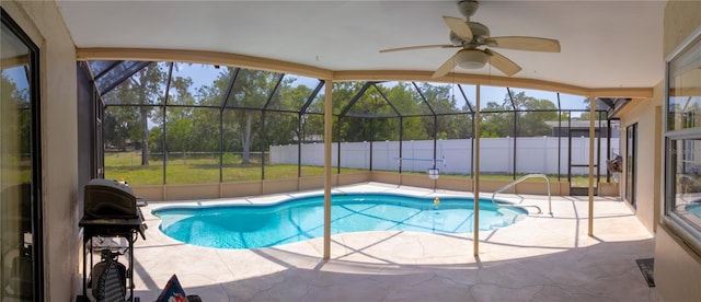 8126 Wooden Dr, Spring Hill, FL 34606 - view of swimming pool featuring a patio area, fence, a ceiling fan, and glass enclosure