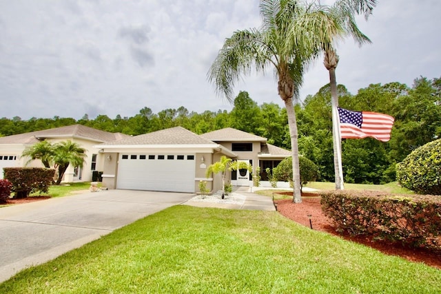 1723 Cortleigh Dr, Trinity, FL 34655 - view of front of home with an attached garage, driveway, stucco siding, and a front lawn