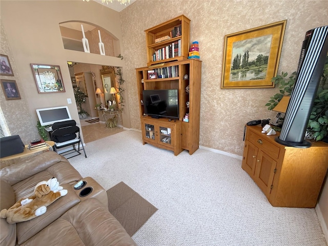 9311 Haas Dr, Hudson, FL 34669 - living room with baseboards, light carpet, and wallpapered walls