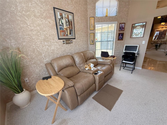 9311 Haas Dr, Hudson, FL 34669 - living room with carpet and baseboards