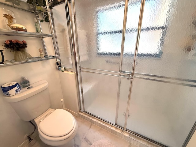 9311 Haas Dr, Hudson, FL 34669 - bathroom with a stall shower, toilet, and marble look tile flooring