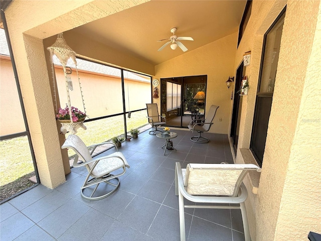 9311 Haas Dr, Hudson, FL 34669 - sunroom with ceiling fan and lofted ceiling