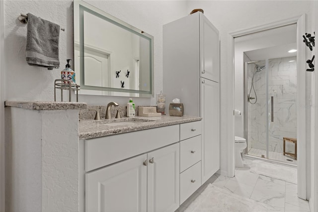 2026 Golfview Dr Unit 2026, Tarpon Springs, FL 34689 - bathroom featuring a marble finish shower, toilet, marble look tiles, and vanity