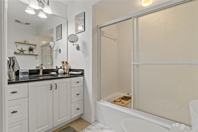 2026 Golfview Dr Unit 2026, Tarpon Springs, FL 34689 - bathroom with vanity and shower / bath combination with glass door