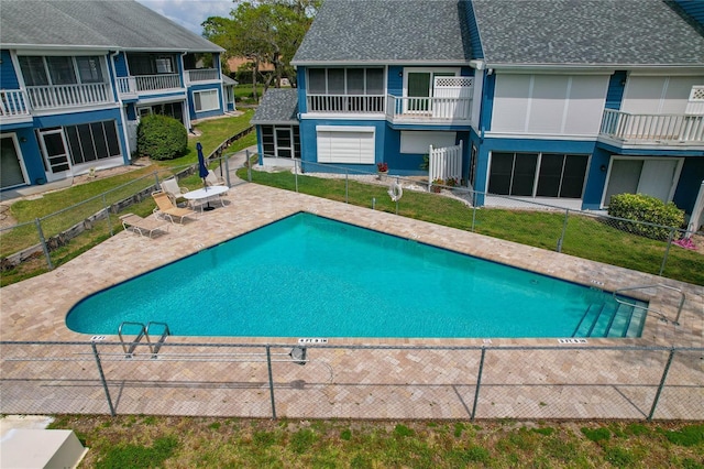 2026 Golfview Dr Unit 2026, Tarpon Springs, FL 34689 - community pool featuring a patio area
