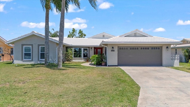 single story home with stucco siding, an attached garage, and concrete driveway
