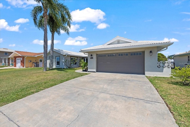 single story home featuring stucco siding, concrete driveway, a tiled roof, and an attached garage