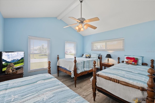 bedroom with light wood-type flooring, a ceiling fan, and baseboards
