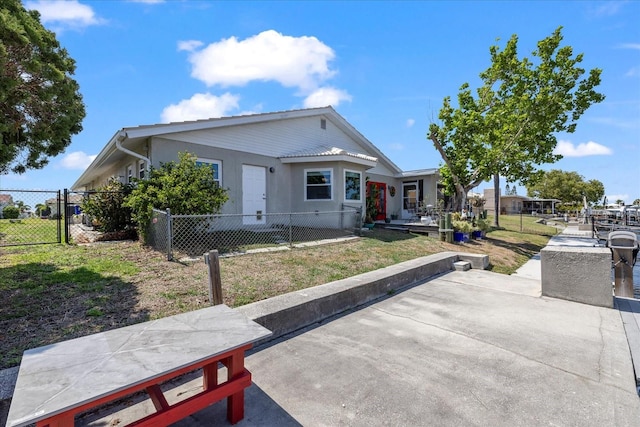 view of front of home featuring a patio