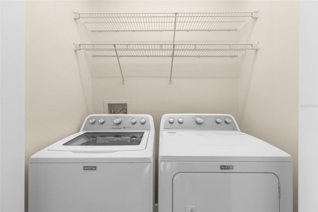 laundry area featuring separate washer and dryer