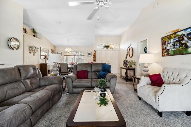 3773 E Lake Todd Dr, Hernando, FL 34442 - carpeted living room featuring a chandelier, vaulted ceiling, and ceiling fan