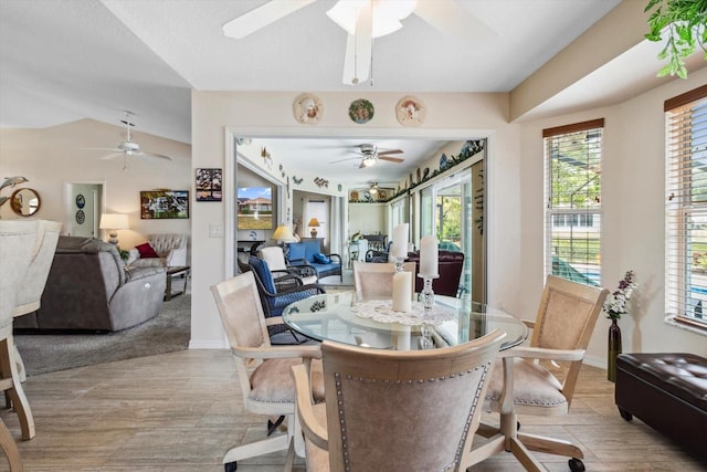 3773 E Lake Todd Dr, Hernando, FL 34442 - dining room featuring ceiling fan, vaulted ceiling, and baseboards