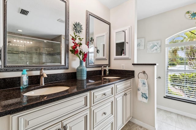 3773 E Lake Todd Dr, Hernando, FL 34442 - full bath with a shower stall, plenty of natural light, double vanity, and baseboards
