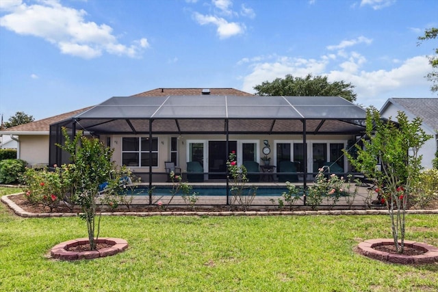 3773 E Lake Todd Dr, Hernando, FL 34442 - rear view of house featuring a yard, glass enclosure, and an outdoor pool